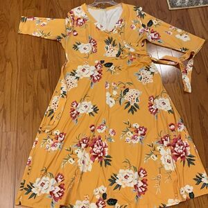 Size extra large faux-wrap mustard with red white and green floral detail NWOT
